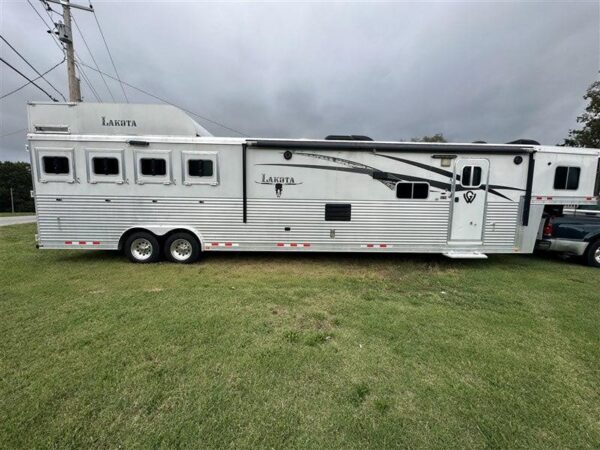 2014 Lakota Bighorn 8416, Generator, Couch, Dinette 17’ Shortwall, 4 Horse Trailer, 12' Slide.